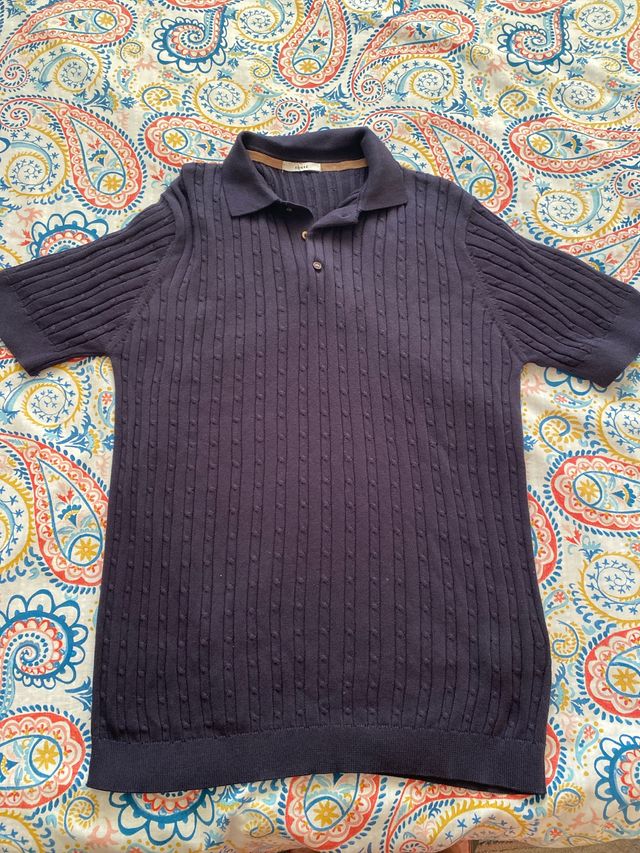 Polo de punto azul marino