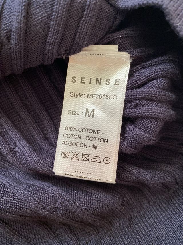 Polo de punto azul marino