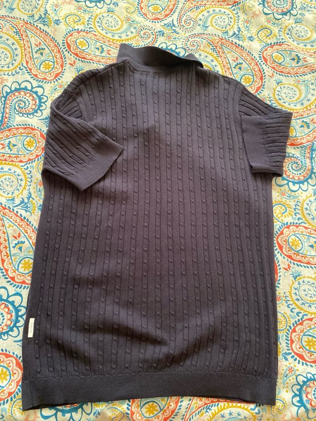 Polo de punto azul marino