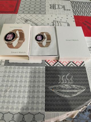 Smartwatch Fitness oro rosa sin uso