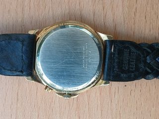 Reloj Lotus cuarzo alarma dorado