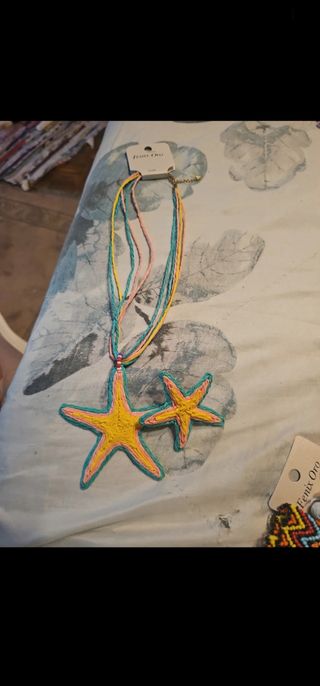 Colgante estrellas Fenix Oro