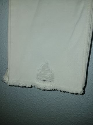 Vaqueros rectos blancos rotos