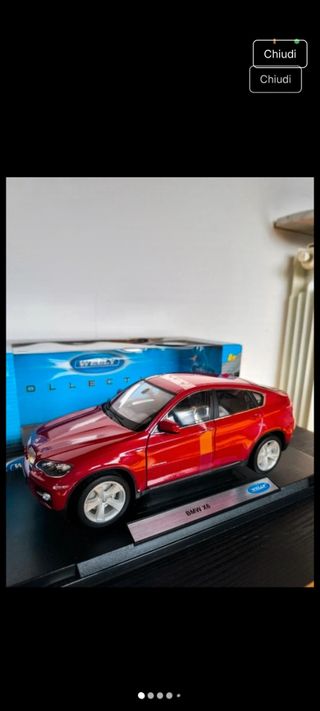 BMW X6 1/18 y subaur 1/18