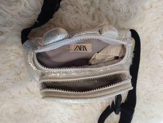 Riñonera Zara niña plateada