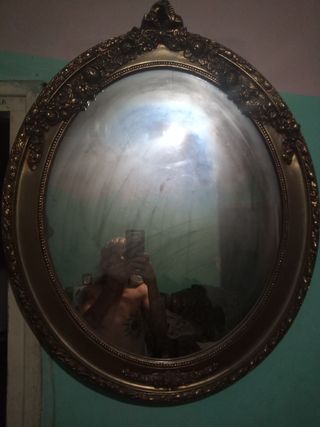 Espejo ovalado antiguo