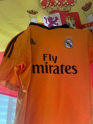 Camiseta Real Madrid niño naranja
