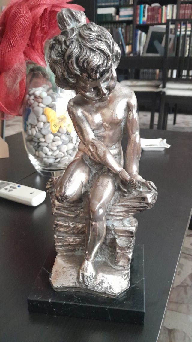 Figura niño plata antigua