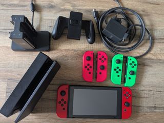 Pack Nintendo Switch + Joycons + Base Carga