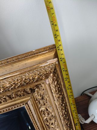 Espejo dorado antiguo