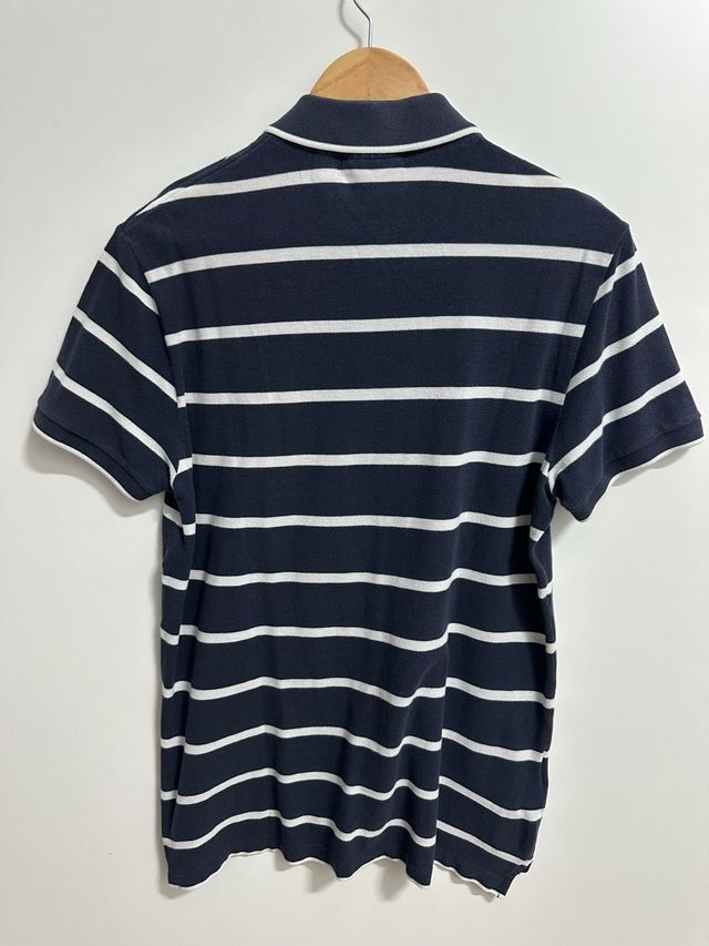 Polo Lacoste Fairplay rayas azul-blanco