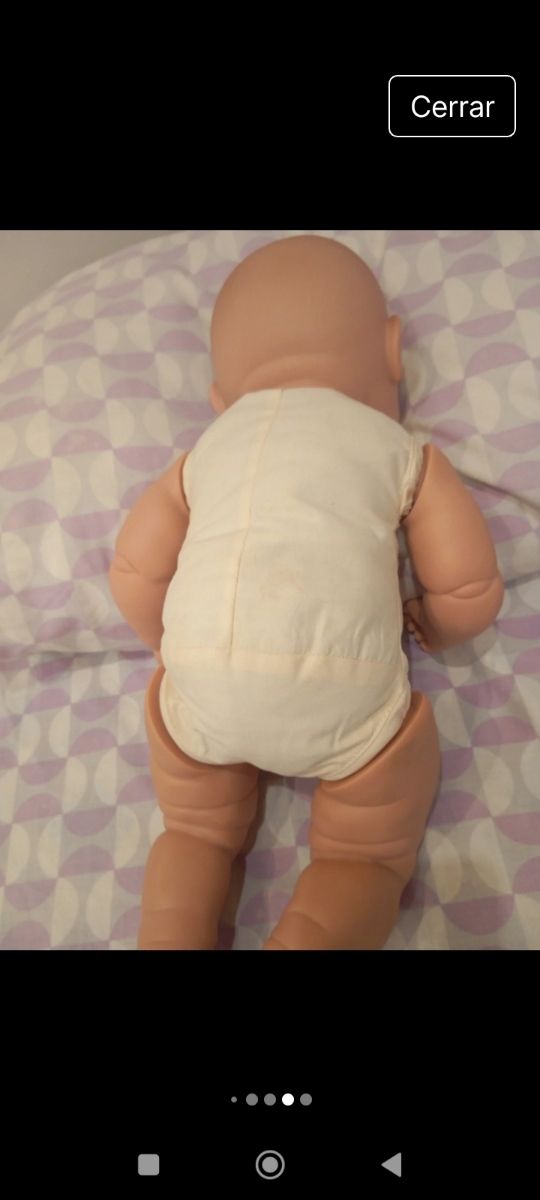 Muñeco bebé 
Dice mamá y papa