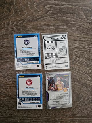 4 Cromos NBA: DeRozan, Reaves, Young, Kuzma