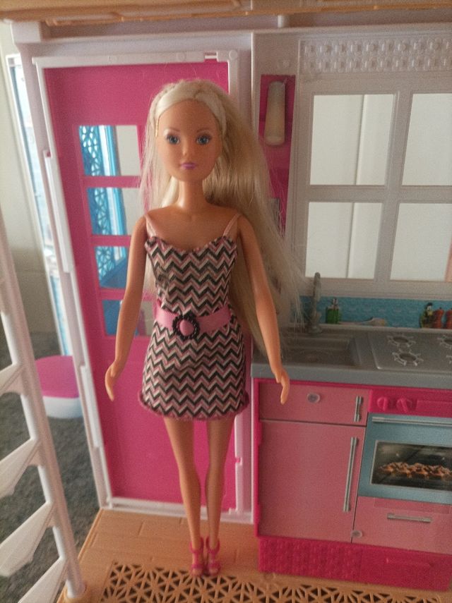 Casa Barbie plegable + muñeca