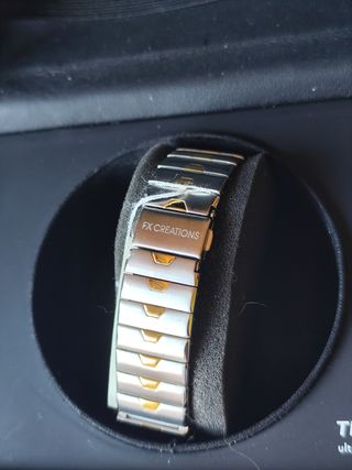 Reloj FX Creations dorado y plateado nuevo 