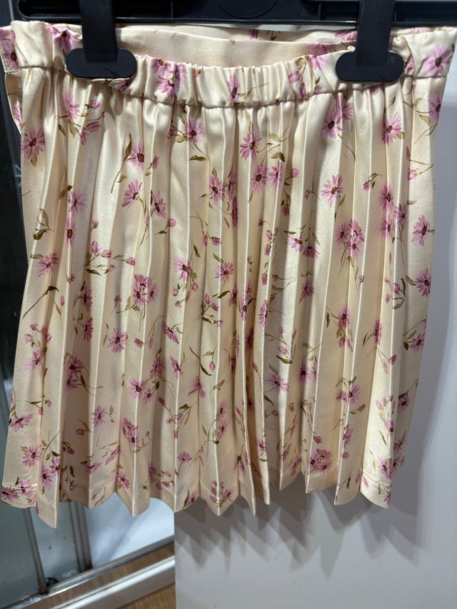 Falda plisada floral beige-rosa niña