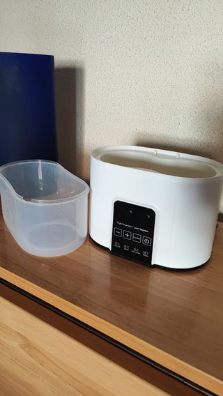 Esterilizador y calentador de biberones eléctrico