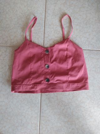 Top rosa a spalla scoperte