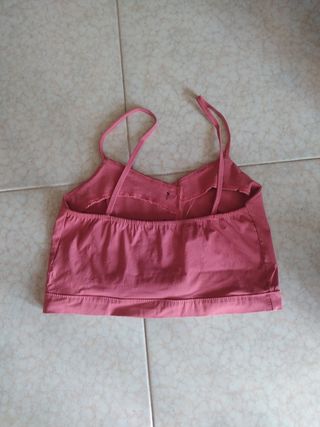 Top rosa a spalla scoperte