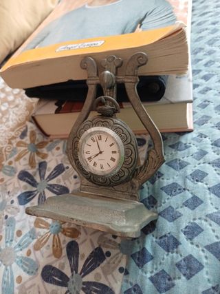 Reloj antiguo de lira