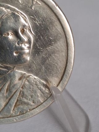  Monedas $1: Sacagawea & Tratado Wampanoag.
