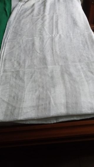 Quattro tende da interni color panna a righe