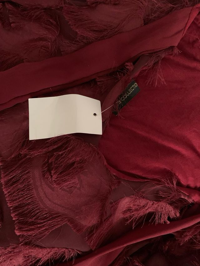 Blusa burdeos con flecos