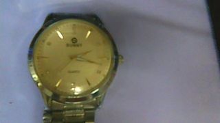 Reloj Sunny dorado y plateado