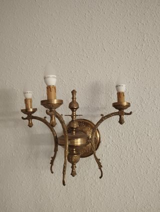 Candelabro antiguo dorado,con más de 145 años