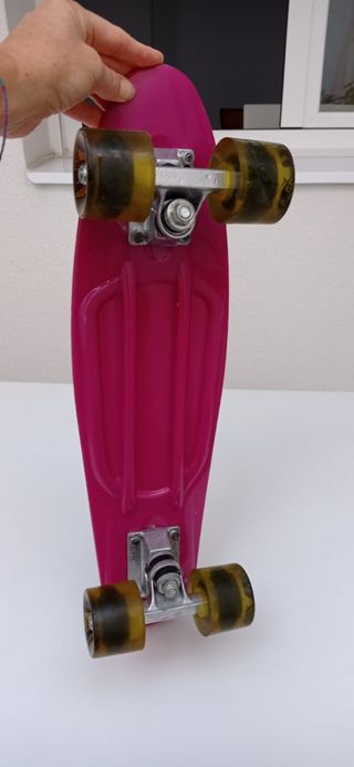 Monopatín rosa