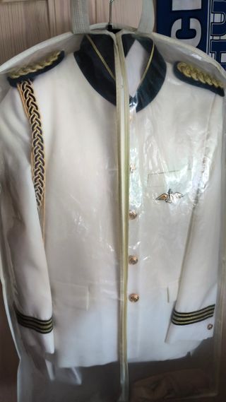 Traje de comunión blanco y dorado