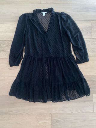 Miniabito nero con  pois a rilievo 