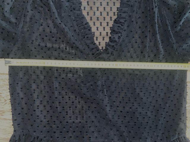 Miniabito nero con pois a rilievo