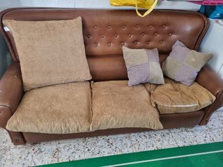 Sofá de cuero y pana
