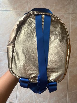 Mochila dorada con estrellas 