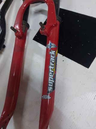 Horquilla con suspension y manillar bici montaña