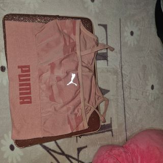 Top deportivo Puma rosa