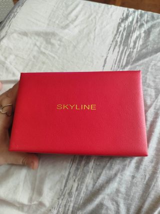 Reloj y pulsera Skyline dorados
