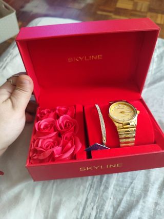 Reloj y pulsera Skyline dorados