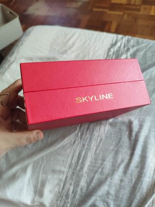 Reloj y pulsera Skyline dorados