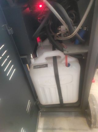 Máquina cambio y limpieza para cajas de cambios 