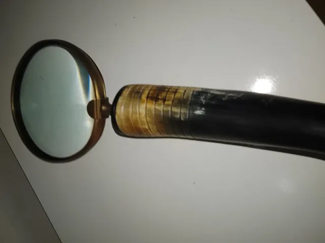 Lupa bronce y cuerno. MEJOR QUE NUEVA