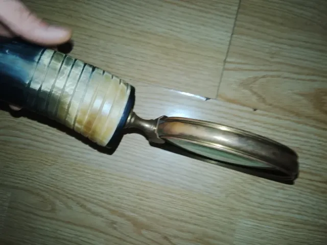 Lupa bronce y cuerno. MEJOR QUE NUEVA