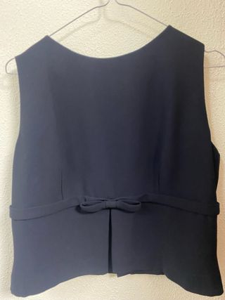 precioso top elegante con lazo delantero 