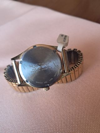 Reloj Racer cuarzo dorado