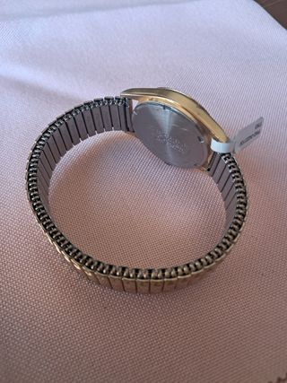 Reloj Racer cuarzo dorado