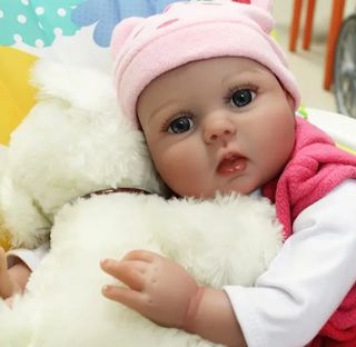 Muñeca reborn 22" 55cm con accesorios 