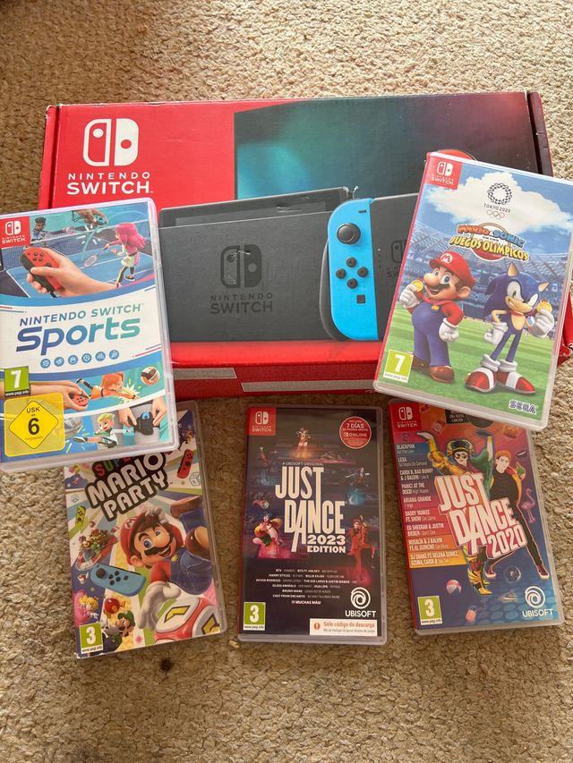 Nintendo Switch + 4 
juegos