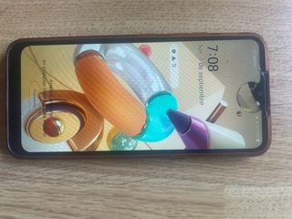 telefono LG grigio - schermo danneggiato