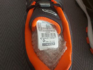 Zapatillas Kalenji grises y naranjas